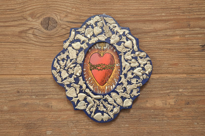 Wooden Medallion with Milagros featuring the Sacred Heart