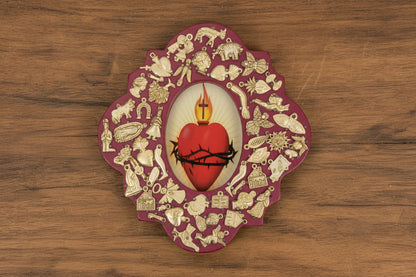 Wooden Medallion with Milagros featuring the Sacred Heart