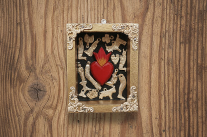 Small Frames featuring the Sacred Heard.  Available with or without charms.
