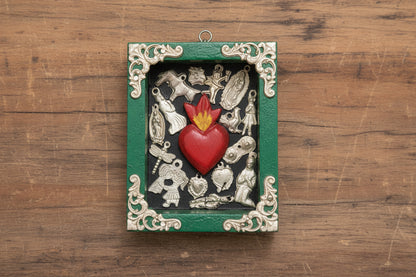 Small Frames featuring the Sacred Heard.  Available with or without charms.